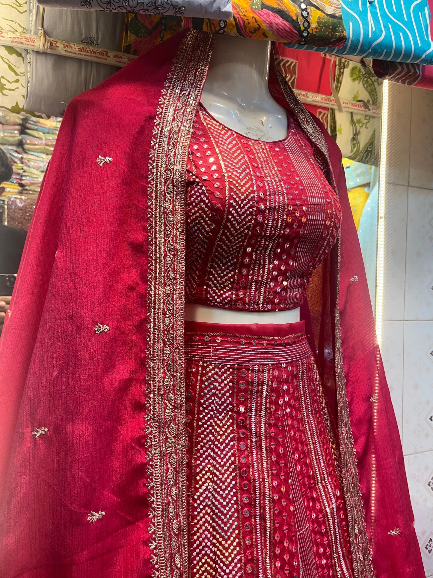 Royal Crimson Mirror Work Lehenga.