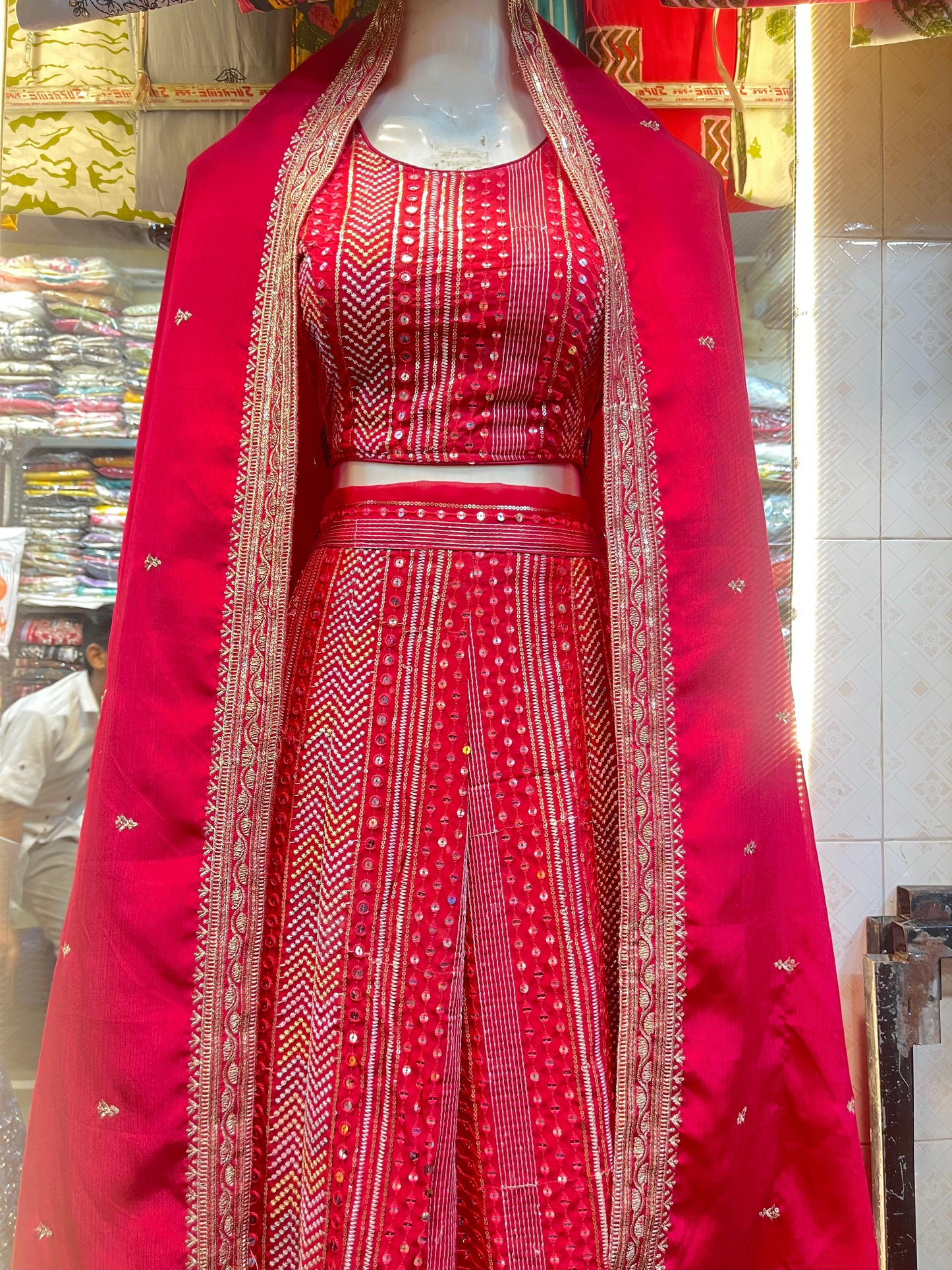 Royal Crimson Mirror Work Lehenga.