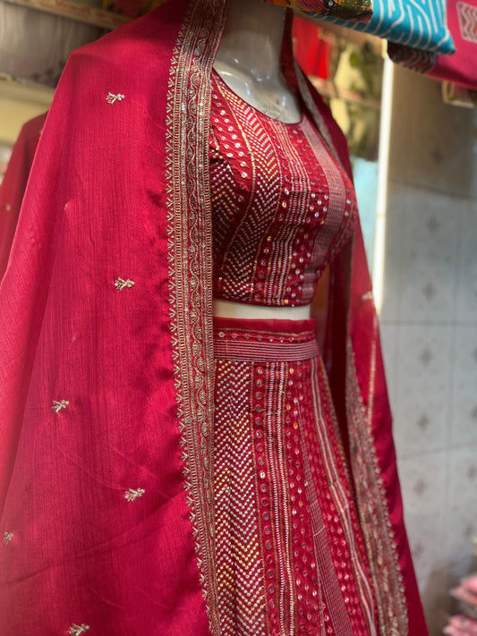 Royal Crimson Mirror Work Lehenga.