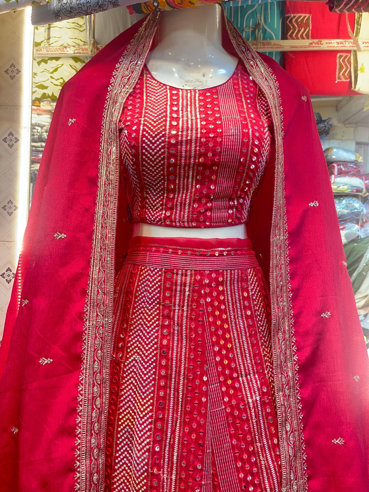 Royal Crimson Mirror Work Lehenga.